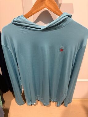 Fox Chapel. large. Johnnie-O Light Blue Performance Shirt with Mauve Trim.